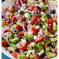 Greek Salad · Feta cheese, olives, red onion, tomato, cucumber, and lettuce.