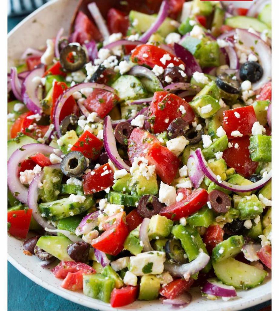 Greek Salad · Feta cheese, olives, red onion, tomato, cucumber, and lettuce.