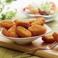 Kids Chicken Nuggets  · 8 crispy chicken nuggets.
