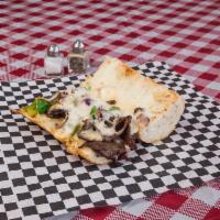 Philly Steak Sandwich · Grilled steak with green peppers, red onions, mushrooms, cheese & sauce.