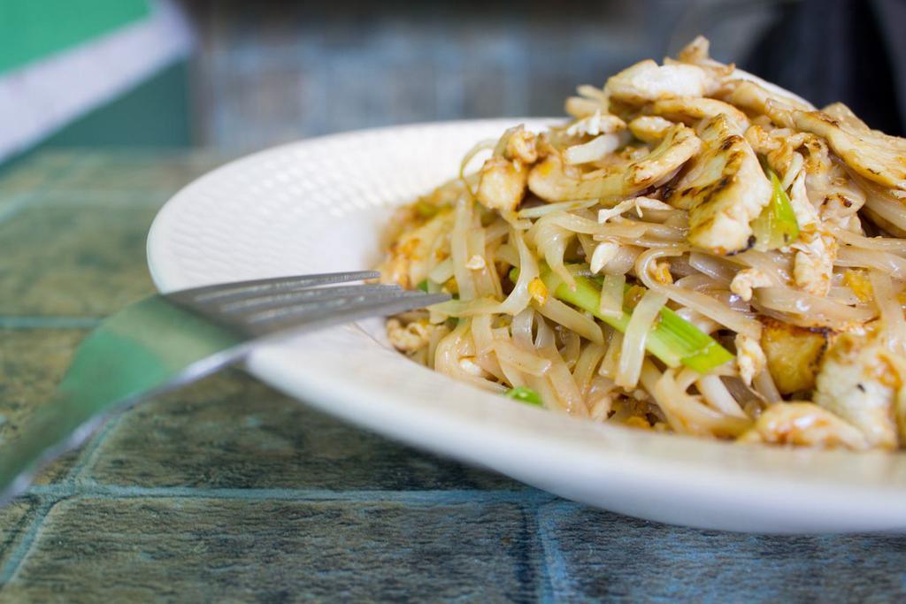 Pad Thai · Stir-fried thin rice noodle, egg, tofu, turnip, bean sprout, scallion, and peanut.