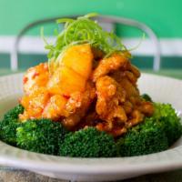 Chicken Volcano · Sauteed crispy chicken with pineapple and cashew nut topped with broccoli in sweet and spicy...