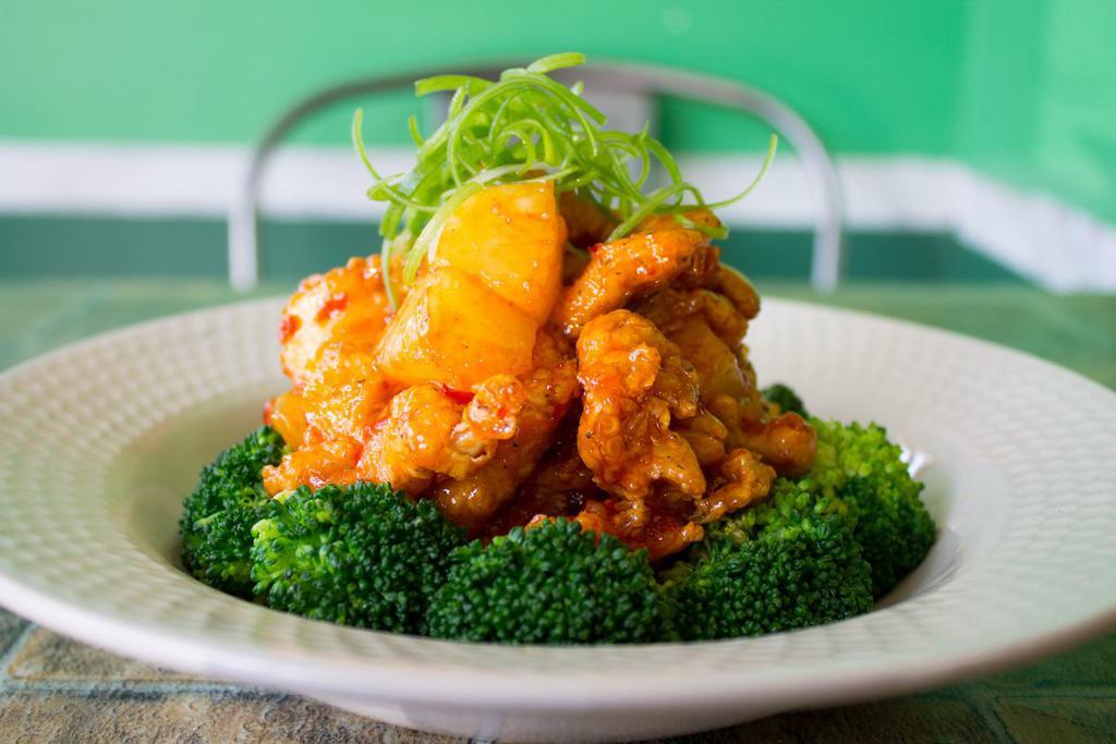 Chicken Volcano · Sauteed crispy chicken with pineapple and cashew nut topped with broccoli in sweet and spicy sauce.