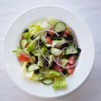 House Salad · Romaine lettuce, cucumber, tomatoes, black olives and red onions.