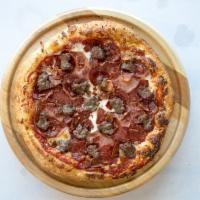 La Carnivore Pizza · Red sauce, mozzarella cheese, pepperoni, salami, Canadian bacon, sausage, crispy bacon.