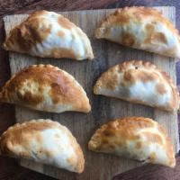 6 Baked Empanadas · Freshly baked. Good for sharing 2 to 3 people.