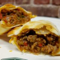 Beef Empanada (B) · Signature ground and rib eye blend, bell peppers, scallions and spices
