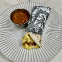 Bacon, Egg, and Cheese Taco  · Pepper bacon, farm-fresh eggs, and aged white Cheddar. Served with homemade salsa Rojo on a ...