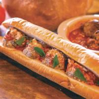 Meatball Parmesan Sandwich · Homemade beef and veal Italian meatballs, Russo’s Chianti-braised meat sauce, and Wisconsin ...