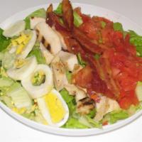 Cobb Salad · Grilled chicken breast, bacon, hard boiled egg, lettuce, and tomato. Served with your choice...