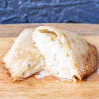 3 Cheese Empanada · Mozzarella, provolone, ricotta cheese, hint of garlic.