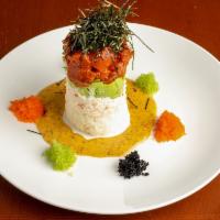 Ahi Tower Plate · Layered spicy sesame tuna, avocado, crab salad, rice, creamy wasabi, and tobiko.