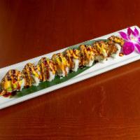Dragon Roll · 8 pieces. Shrimp tempura and salmon, topped with unagi and avocado, drizzled with unagi sauc...