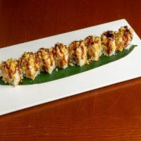 The Pacific NW Roll · 8 pieces. Dungeness crab, spicy albacore, cucumber, topped with albacore, creamy-spicy pesto...