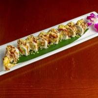 Crunch Roll · 8 pieces. Shrimp tempura, crab salad, and avocado with tempura bits and unagi sauce.