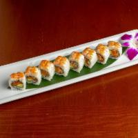 Oregon Roll · 8 pieces. Creamy salmon, avocado, white onion, green onion and masago, topped with shrimp.