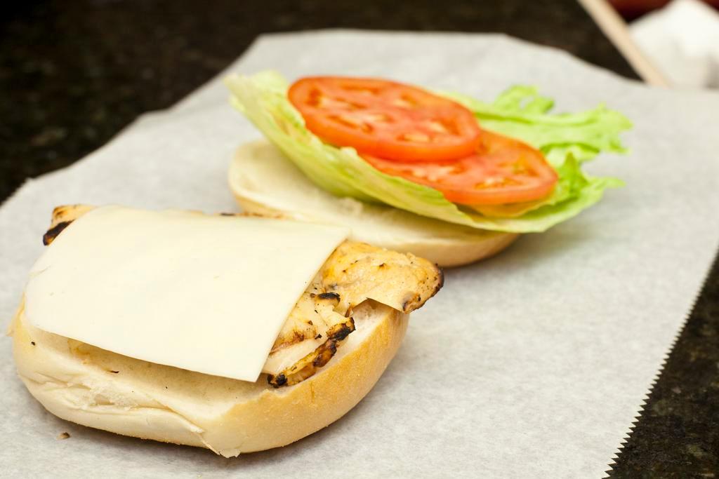 Deluxe Grilled Chicken Sandwich · Grilled Chicken with Lettuce, Tomato, & Mayo on a Roll. Served with French Fries.