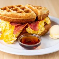 Chicken and Waffle Sandwich · Breaded chicken, 2 eggs, cheese, bacon, syrup and homemade Belgian waffle.