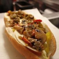 Veggie Philly  · Lettuce, tomatoes, green and banana peppers, fried onions, mushrooms and cheese.