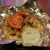 Chicken Gyro Sandwich  · Pita, chicken, cucumber sauce, onions, tomatoes, feta cheese and olives.