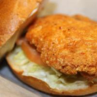 Breaded Chicken Breast Sandwich · Lightly breaded chicken with mayo, lettuce and tomatoes.