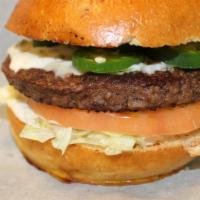 Jalapeno Burger · 1/2 lb. Angus patty, pepper jack cheese, jalapeno ranch, lettuce, tomatoes, pickle and onion.