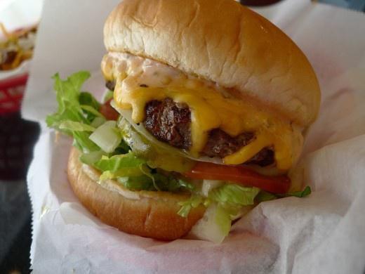 Mac Burger  · 1/2 lb. Angus patty, lettuce, tomato, onion, pickle, 1000 island sauce and American cheese.