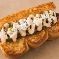 OLD TOWN · smoked bacon wrapped dog, caramelized onions, chipotle aioli, picked jalapeños, cotija cheese