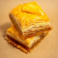 Baklava · Sweet dessert pastry made of layers of filo filled with chopped nuts and sweetened with syru...