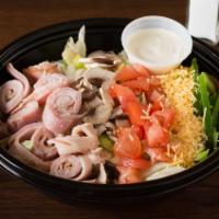 Chef Salad · Ham, turkey, cheese, onions, croutons, green peppers, tomatoes and mushrooms.