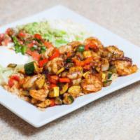 Camarones Yucatan Special · Marinated shrimp grilled with red and green peppers, onions, squash, and zucchini. Served wi...