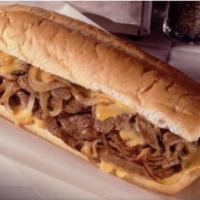 Philly Cheese Steak Sandwich · Ground beef steak marinated with herbs and mixed with onions, peppers and choice of cheese.