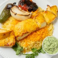 Special Persian Saffron Chicken Kabob · Pieces of chicken breast marinated in our seasoning, Saffron, grilled on skewers over fire g...
