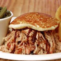 BBQ Pork on Cornbread Plate · Comes with two sides and choice of bread (Serves 1 Person)