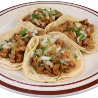 2. Four Tacos · Choice of meat, onions, cilantro. salsa.