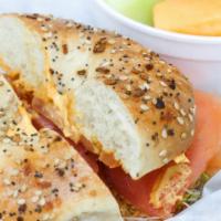 Wild Lox Bagel Breakfast Sandwich · Norwegian wild caught smoked salmon, your choice of An Original New York  toasted bagel, cap...