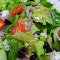 Greek Salad Lunch · Crisp romaine lettuce, feta cheese, cherry tomatoes, olives, red onion, green peppers, cucum...