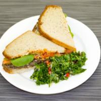 Southwest Black Bean Burger · Contains black beans, corn, avocado, green onions, cilantro, spinach, tomato, pickle and red...