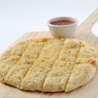 Breadsticks · Served with our signature pizza sauce.