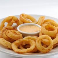 Onion Rings · Breaded sweet onion rings served with ranch.