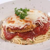 Chicken Parmesan Pasta · Grilled or crispy chicken over spaghetti marinara or fettuccine Alfredo. Served with a garli...