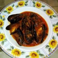 Mussels with Marinara Sauce · Mollusk with a seasoned tomato sauce. 