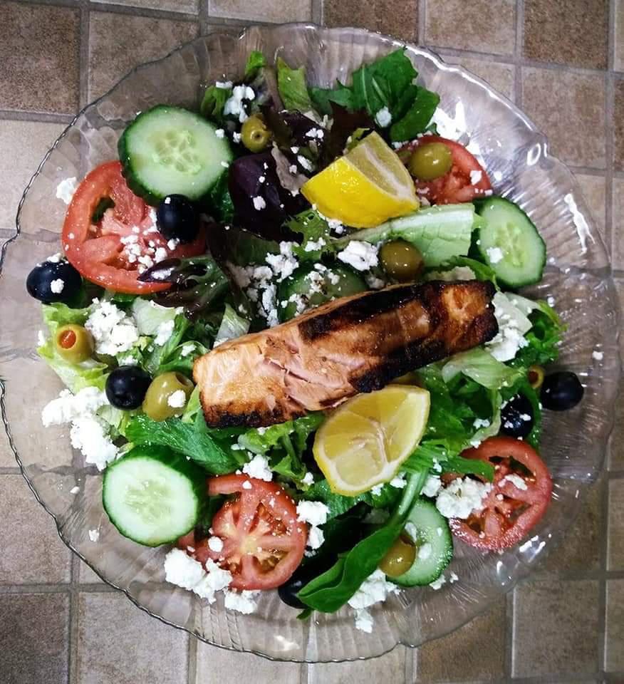 Charlotte's House Salad · Romaine, cucumbers, grape tomatoes, feta, olives and choice of dressing served on the side.