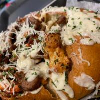 Alfredo bread bowl  · Rich butter and Parmesan sauce.