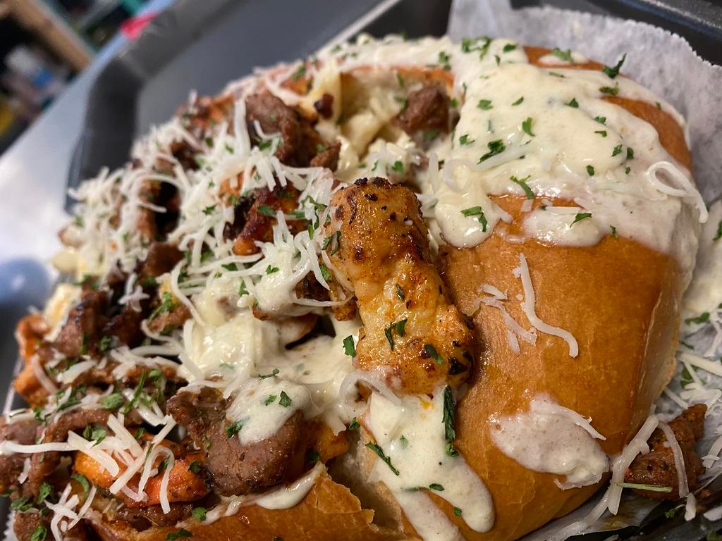 Alfredo bread bowl  · Rich butter and Parmesan sauce.