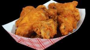 Chicken Wing Dings · Crispy fried breaded chicken wings available as plain, BBQ and Buffalo or sweet chili style.
