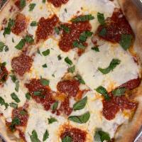 Margherita Pizza · Savory pie with a dough base topped with sauce and cheese.