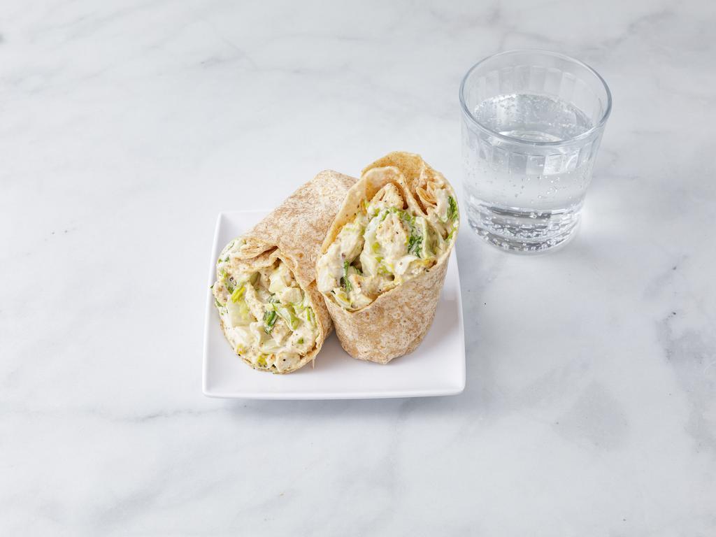 Caesar Grilled Chicken Wrap · With Caesar dressing and romaine lettuce. Served with a canned drink.