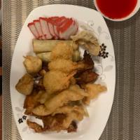 12. Pu Pu Platter · BBQ pork, fried dumpling, fried shrimp, fried chicken egg roll, cheese wonton, chicken wing,...