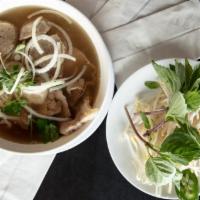14. Pho Tai Chin Nam Gan Sach · Rare beef, brisket, well-done flank and tendon, and tripe.